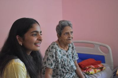 Youthika volunteer interacting with senior